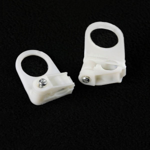 White nylon suspension clevis with blocking and strain relief for flat cable