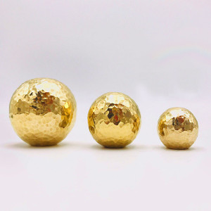 Hammered brass ball...