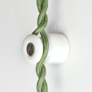 Porcelain wall-mounted bollard for twisted electrical cable - white