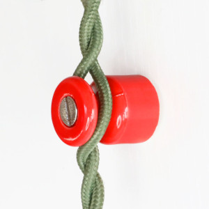 Porcelain wall-mounted bollard for passing twisted electrical cables - colour pink