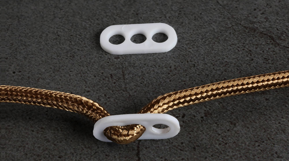 Chape de blocage de cable anti-traction en nylon blanc pour câble rond  Ø 4.5mm