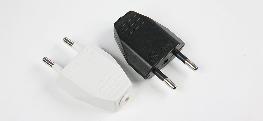 Fiche ou prise mâle 230 volts 2 pôles - 2.5 ampères couleurs blanc ou noir